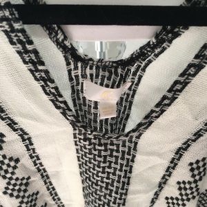 Black and white fringe poncho